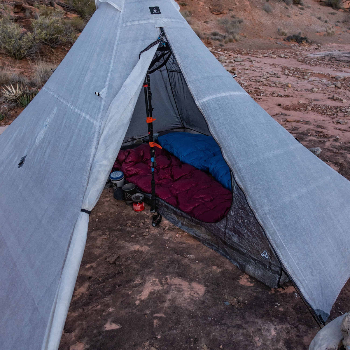 Front view of a campers UltaMid 4 Half Insert Paired with Ultamid 4 Pyramid Tent