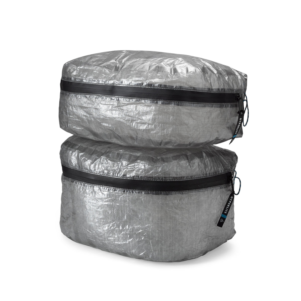 Front view of two different sizes of the Hyperlite Mountain Gear Pods designed with a clamshell design